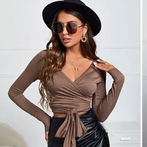 Soft brown wrap top! Very comfortable and stylish. Never worn.